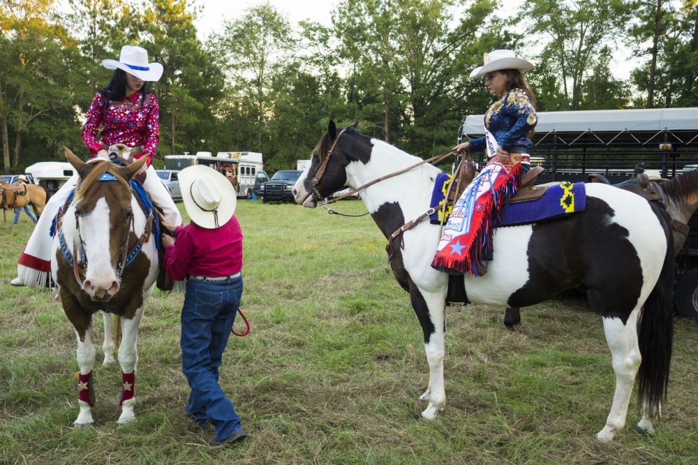  DEVIN REDDING in her Miss Rodeo uniform, with young fans at the 10th Annual Sandy Oaks Pro Rodeo in South Carolina. She is the 2015 Miss Rodeo North Carolina and First Lieutenant/ Finance Officer at Fort Bragg Special Forces Airborne. She spent three tours serving as a Finance Officer in both Fort Bragg and Kabul, Afghanistan. (August 22, 2015/Kevin C. Downs/Cosmos) 
