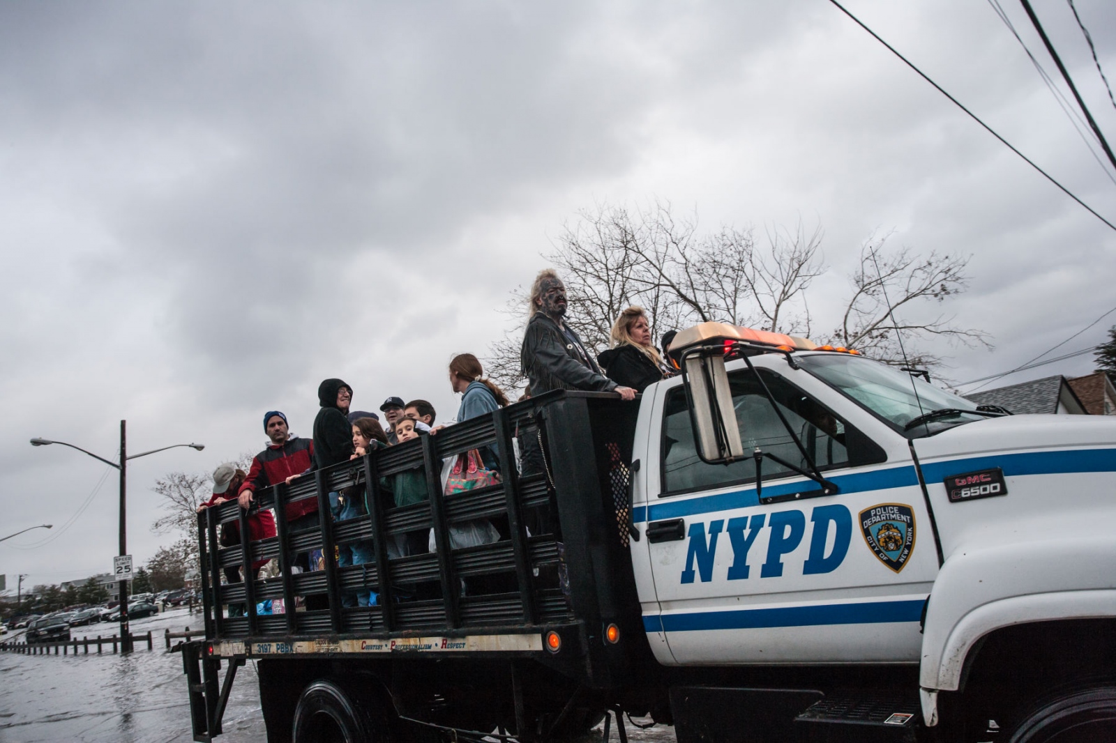 The Rockaways After Hurricane Sandy - Residents of Breezy Point are evacuated by NYPD after...