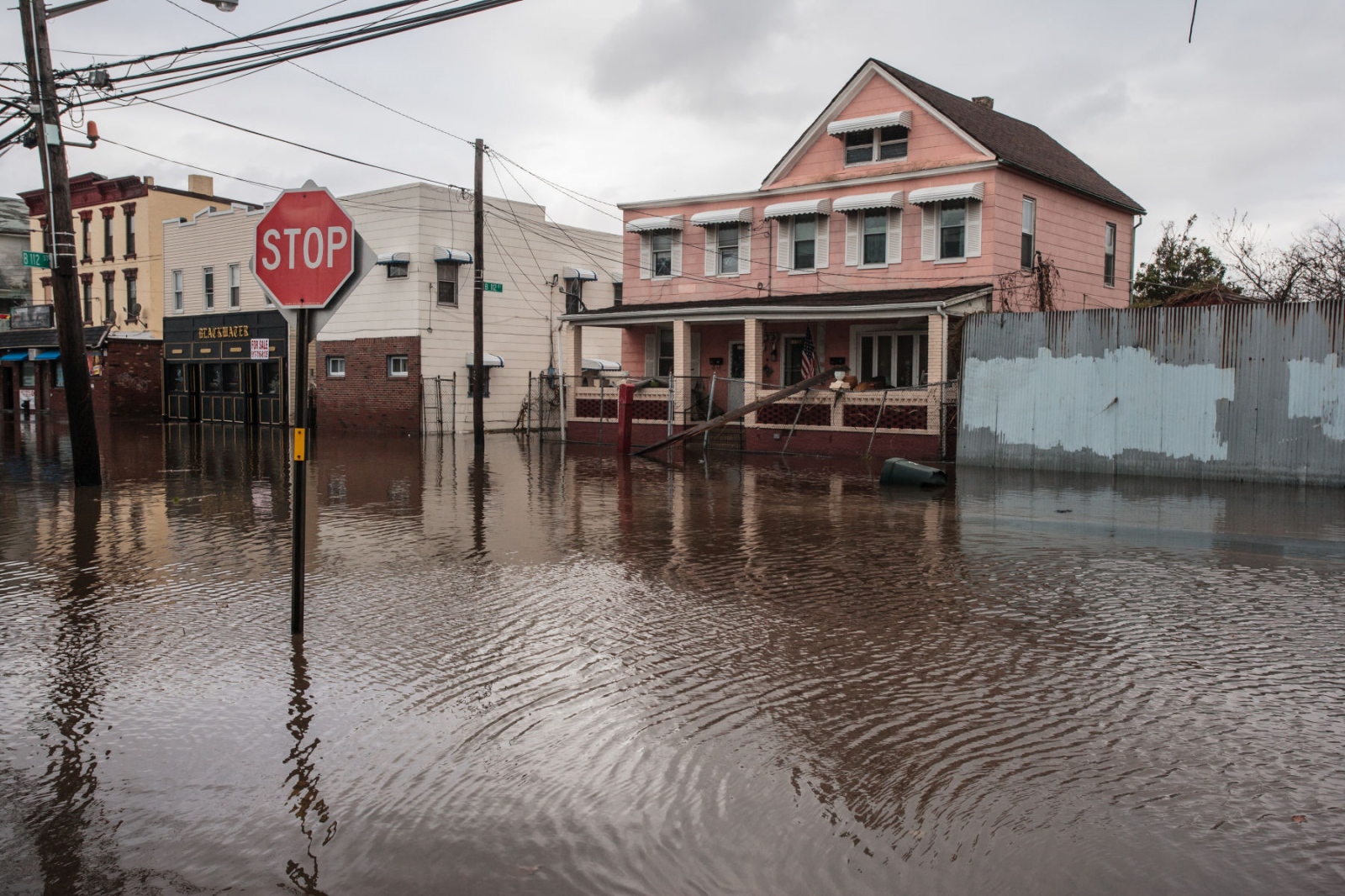 The Rockaways After Hurricane Sandy - Heavy flooding on Beach Blvd in the Rockaways after...