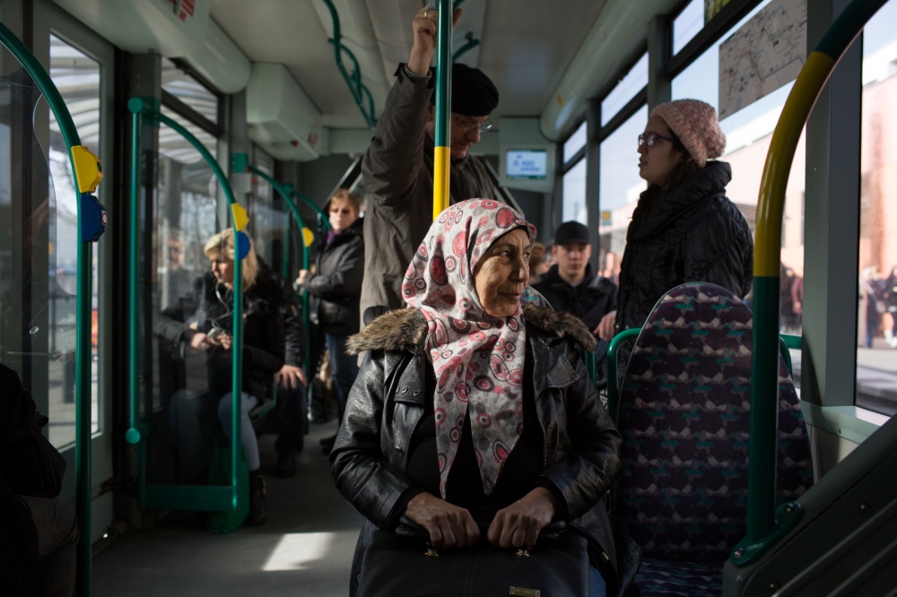  Edeh Fayad, 72, rides the bus ...ee camp in Greece. March 2017. 