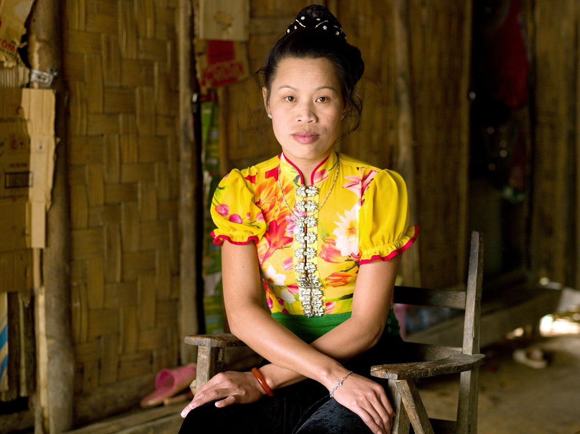 The Corridor of Opportunity - The Nam Ou - Portrait of a Vietnamese prostitute wearing traditional...