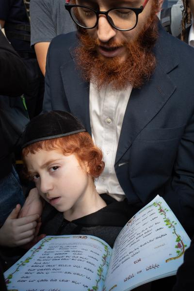 Image from Selected Works - Hasidic man and his son prays  during the Rosh Hashanah...