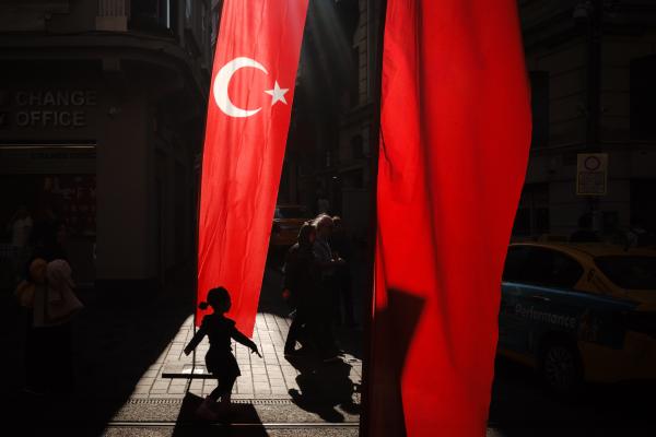 Image from Selected Works - A young child walks in central Istanbul in the evening....