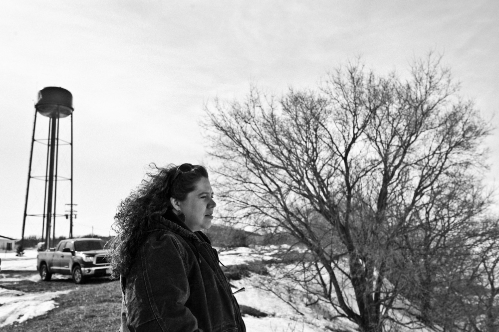  Cristine looking over Red Lake... the street with a new family. 