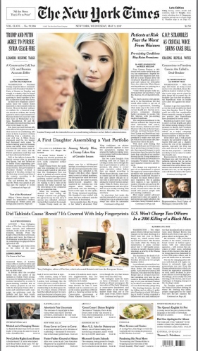 FEATURES -  One photo at the Front page American edition of The NYT....