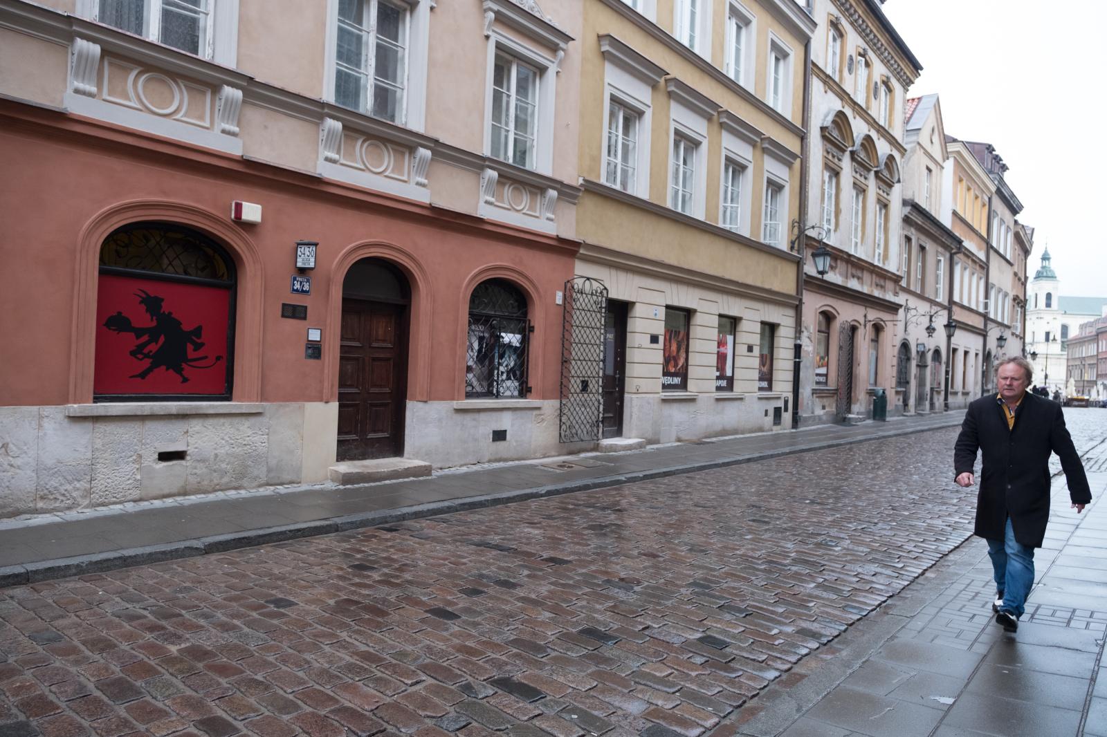 Man on Street Old Town Warsaw | Buy this image