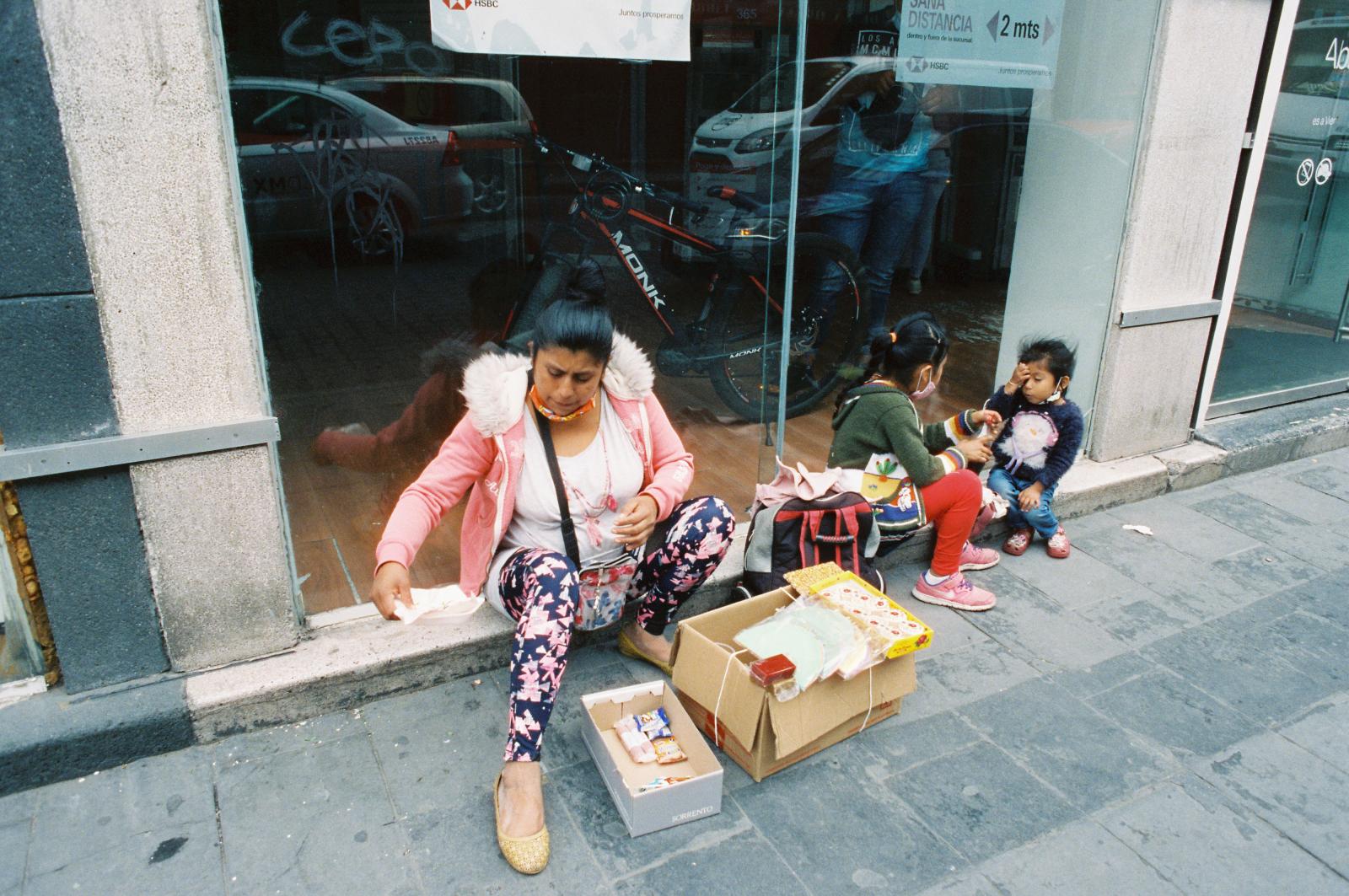 Woman on Street with children 