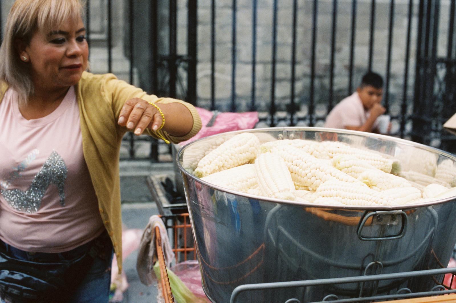 Woman Selling Corn on Street