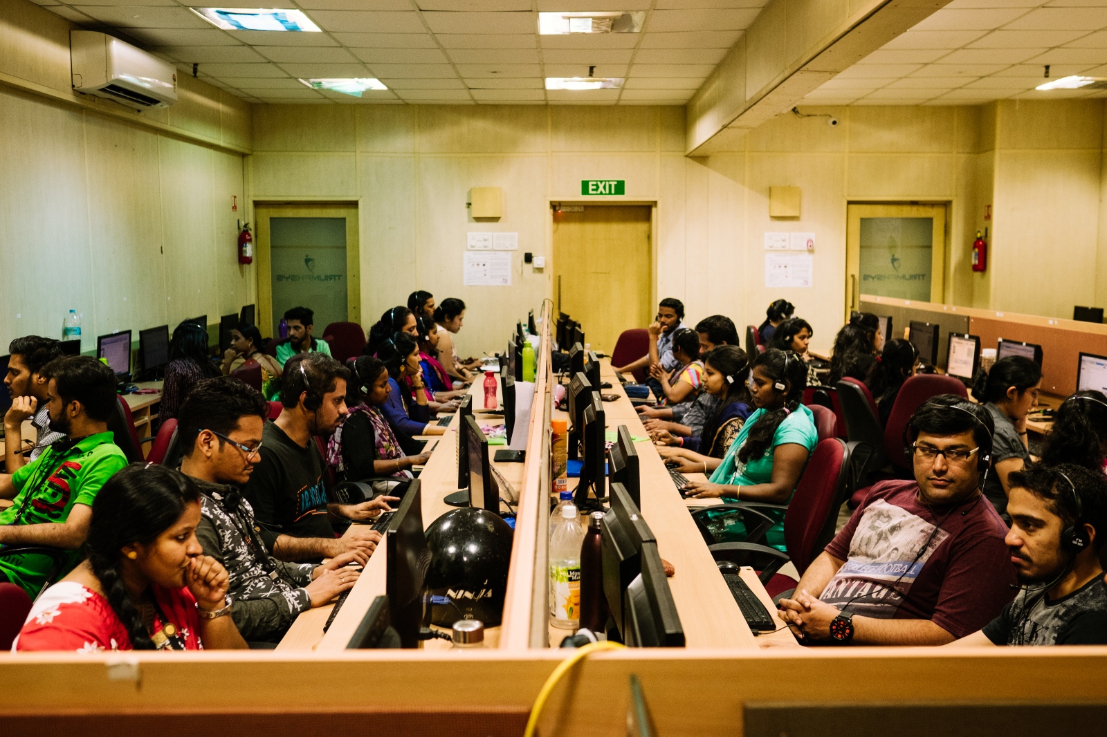 One of the working rooms of Altius, a call centre company based in Navi Mumbai, calling during the day Indian and Middle East based costumers. During the night they call and answer calls from the USA and the UK. Navi Mumbai, India. 8th March 2016.