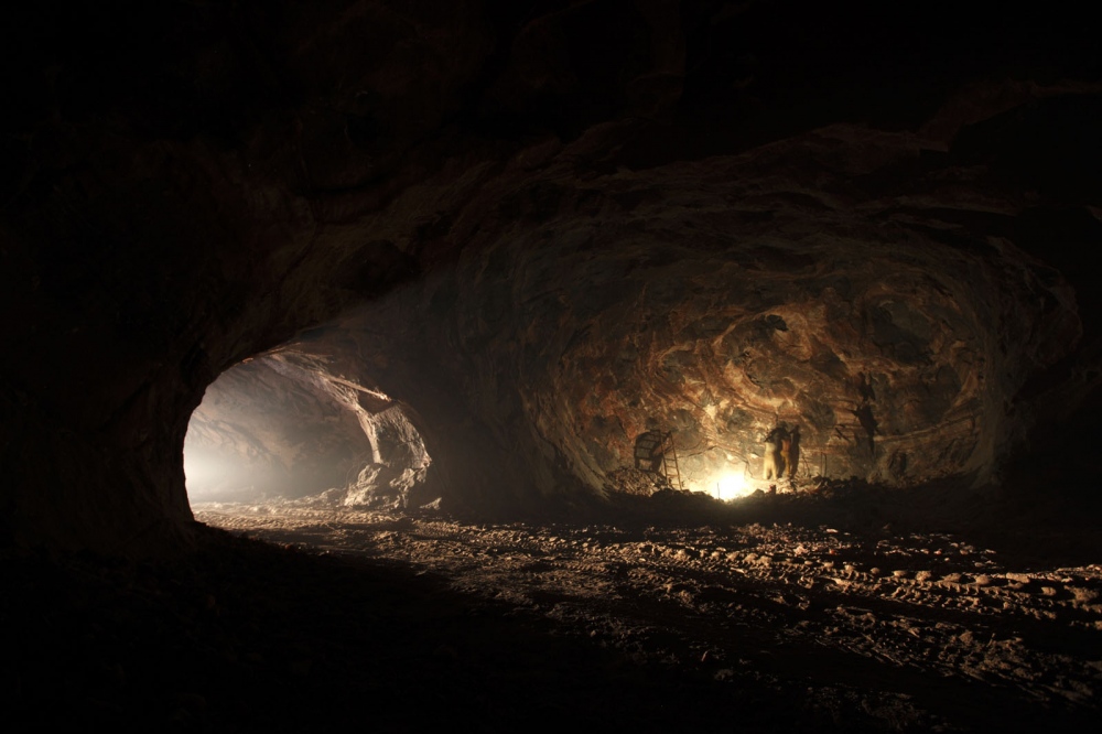  The pitch black mine shafts of the Warcha salt mine, only illuminated by gas lamps or the...
