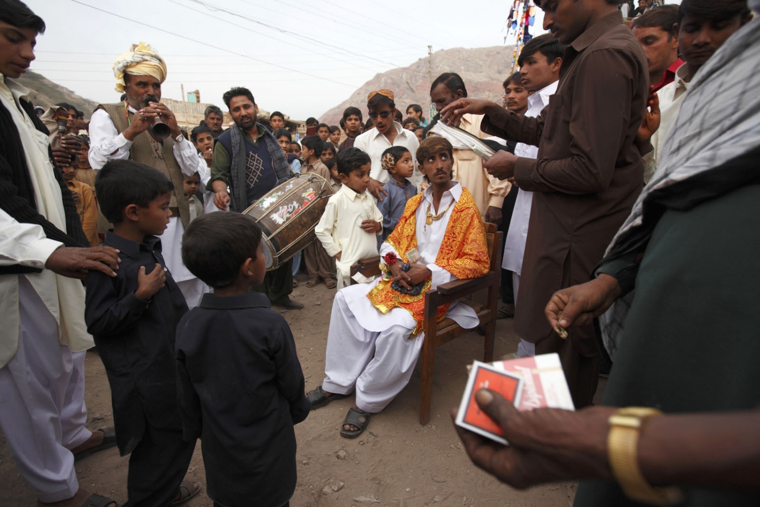 PAKISTAN'S SALT MINES - A wedding celebration is held for a salt worker inside...