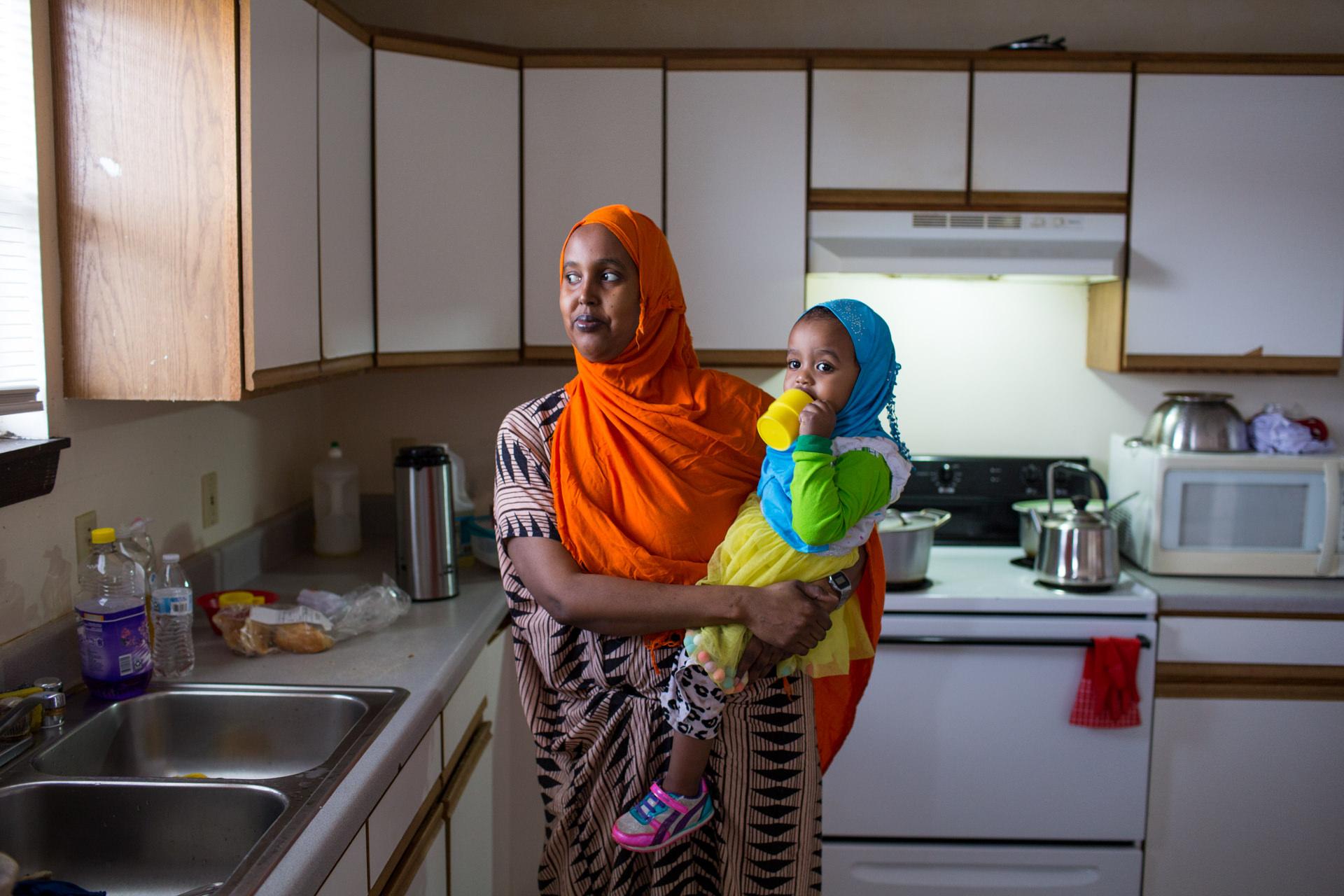Robert Wood Johnson Foundation - Somali refugee Malyun Sulieman with her daughter Ifrah,...