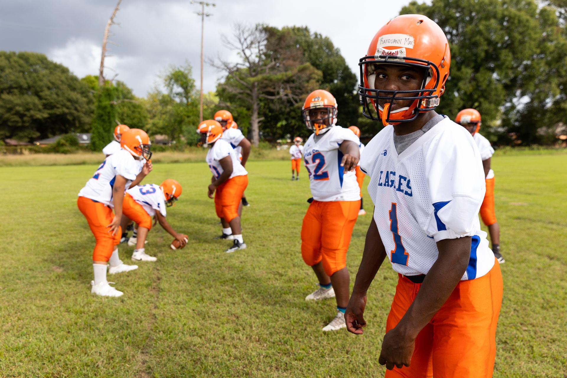 Robert Wood Johnson Foundation - The Drew Eagles junior high football team practices after...