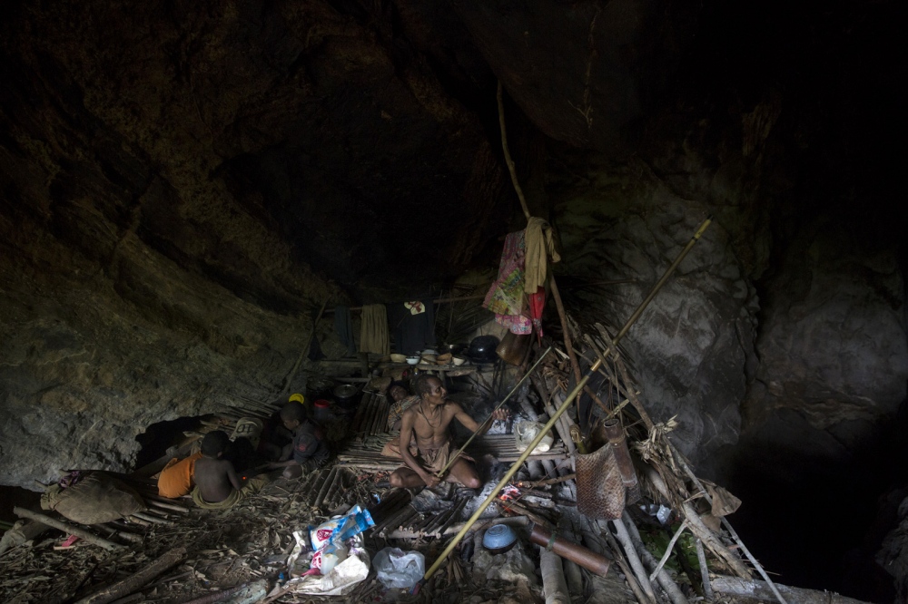 During the rainy season the Maniq search out caves, deep in the forest, where they will stay...