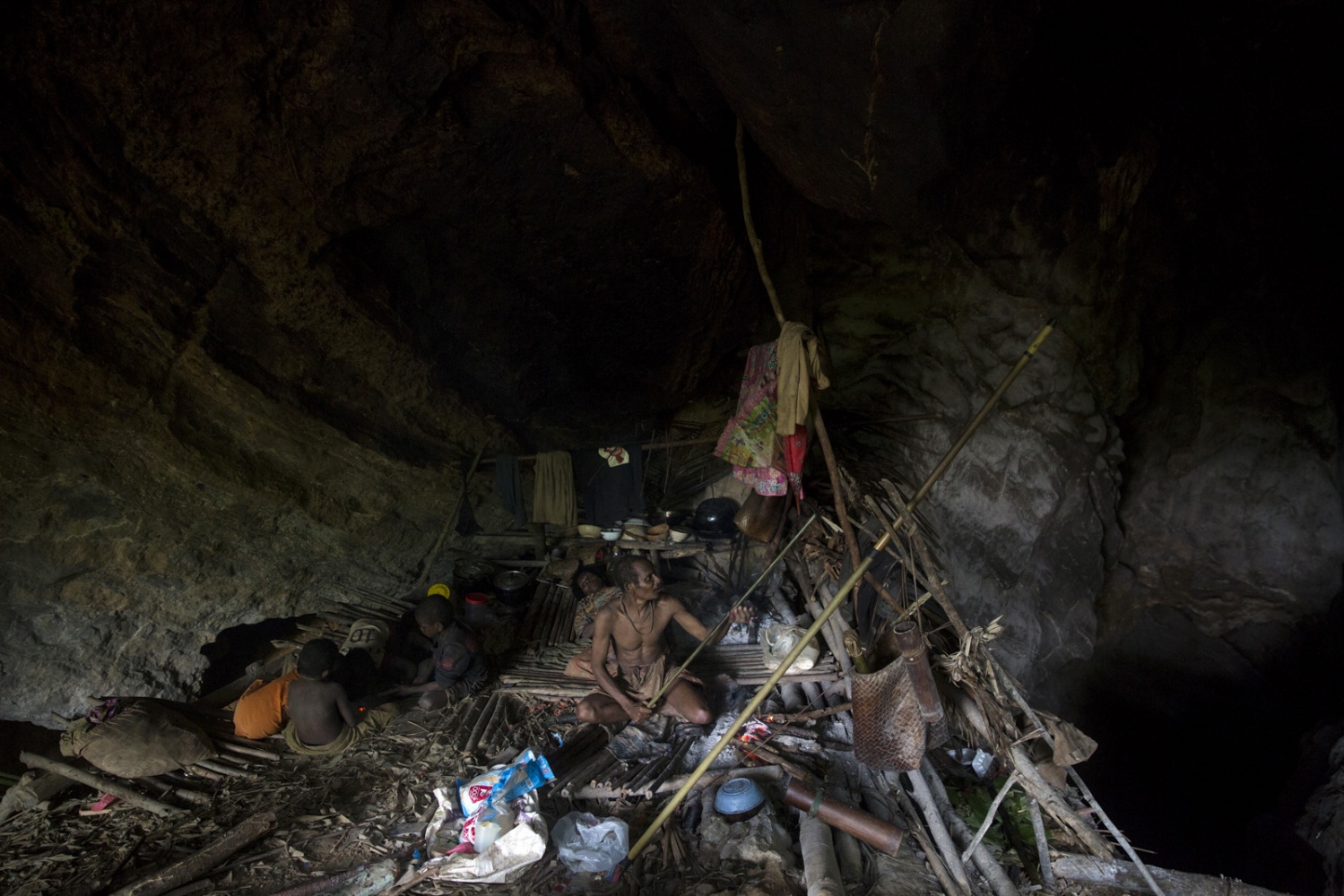 THE MANIQ - During the rainy season the Maniq search out caves, deep...