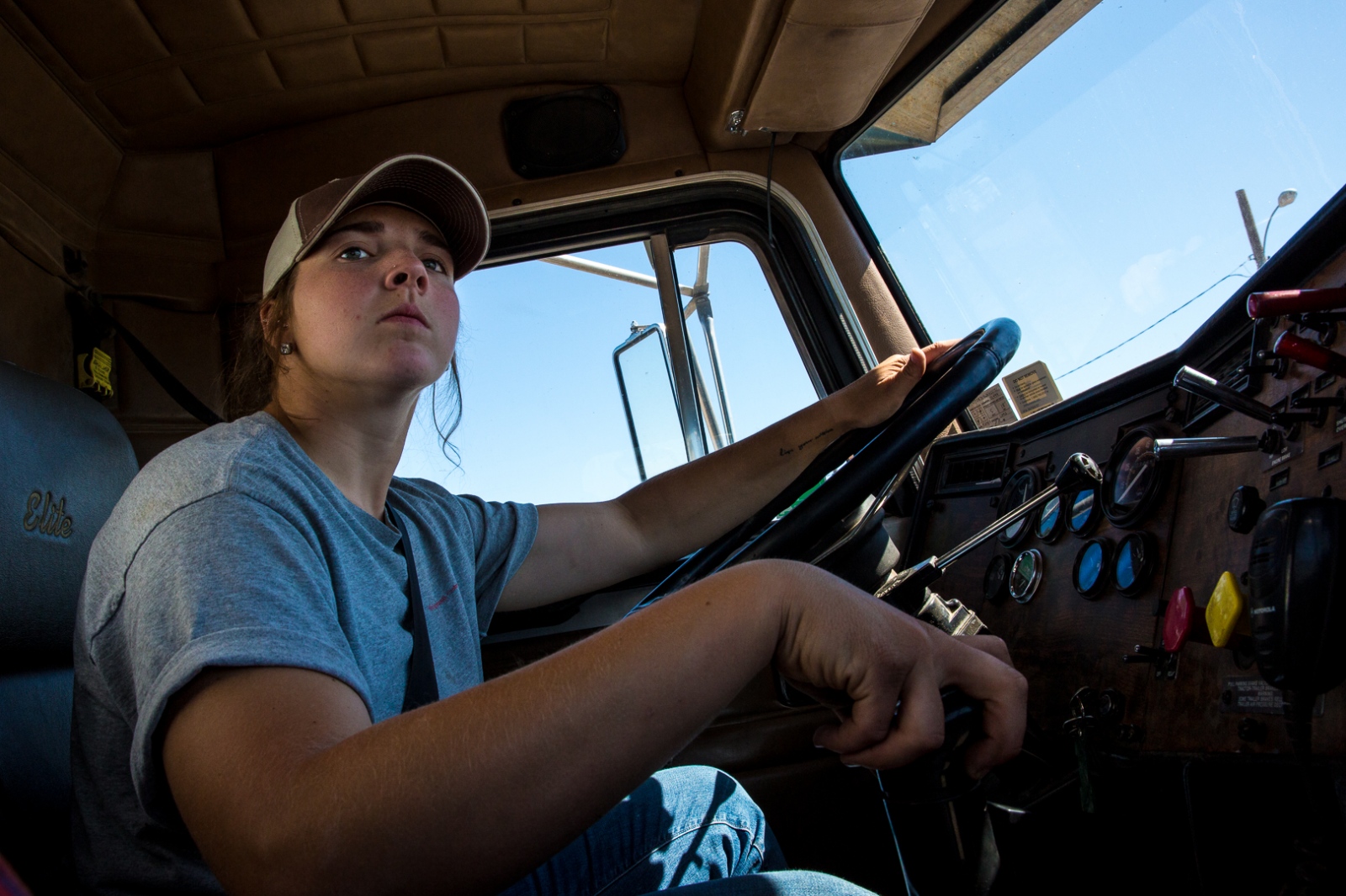 Harvesters -  Regan Wolgemuth drives a semi truck filled with 60...