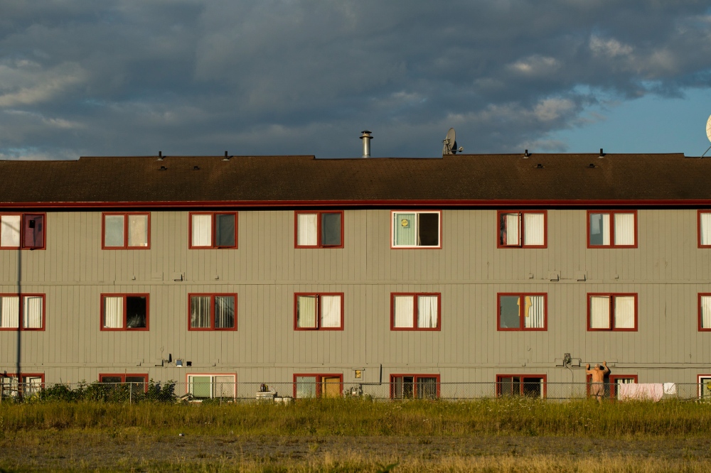 Image from CALL HER ALASKA - An apartment building at sunset in Mountain View.