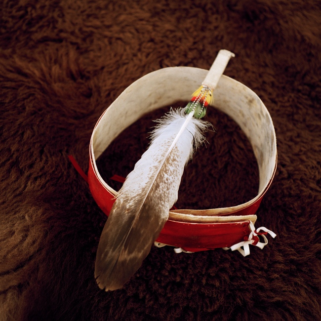 Tracey George Heese&rsquo;s eagle feather and buffalo rawhide belt, symbolic items she uses in ceremony and traditional dance, sit atop buffalo skin. &ldquo;Being initiated into the powwow circles has helped me dance forward in life, to claim back my identity&hellip;to dance for those who cannot dance&rdquo; said Tracey. Her mother, Winnifred George, was murdered and discovered next to a park bench in Edmonton, Alberta over 20 years ago. Tracey has since become active in speaking out on the issue of missing and murdered indigenous women. &ldquo;It is known when holding eagle feathers to speak only the Truth&hellip;for me the MMIW [movement] is to bring awareness for those that can no longer speak.&rdquo; 