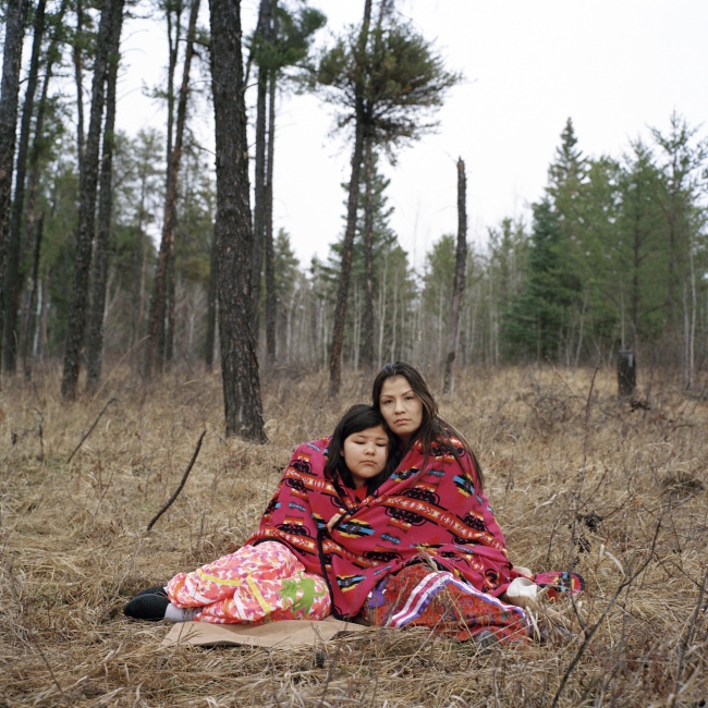 Dannataya, 10 at the time, and her aunt Michelle Burns, 30 at the time, find peace among the trees in Prince Albert, Saskatchewan. Monica Lee Burns, Dannataya&rsquo;s mother and Michelle&rsquo;s twin sister, was murdered by a stranger, 38-year-old white male Todd Daniel McKeaveney, and found dead in a desolate area outside Prince Albert in January 2015. McKeaveney received 13 years in prison. &ldquo;I feel lonesome a lot. My Elder tells me to pray to the Creator and to go near a tree,&rdquo; Michelle said. &ldquo;When you think about all the missing and murdered indigenous women, they don&rsquo;t have a voice, so their family members are the ones trying to have a voice. I have to remember that [Dannataya] is watching me. When I walk, I try to walk with good intentions so that when she&rsquo;s older she won&rsquo;t end up lost. Her mom would want good things for her.&rdquo;