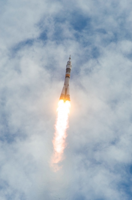 The Soyuz rocket is seen second...speed of 17,500 miles per hour.