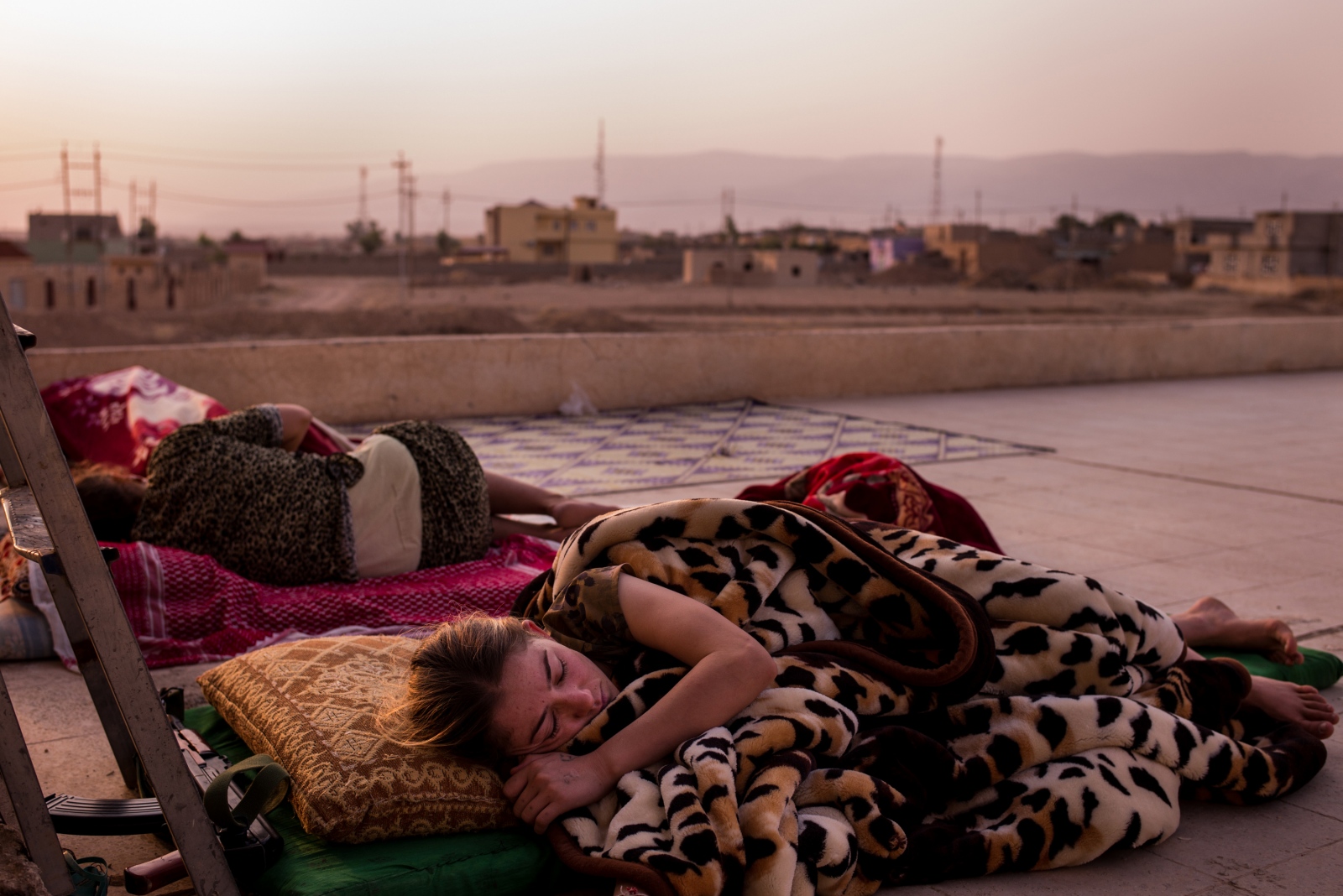 Fighting Back - Lina, a soldier with the Yazidi 'Sun Ladies' battalion,...