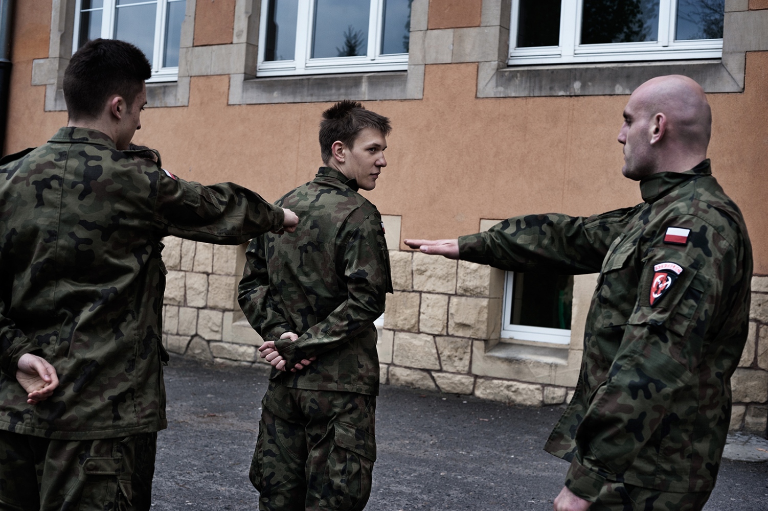  Students from the public High School in Brzeg during the military training under the supervision...