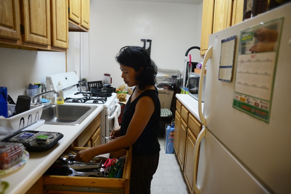Edith Mendoza, 51, prepares dinner at the apartment she shares with three roommates in Queens, NY. I was not comfortableâ€¦always out of place. I would cook for them but feel hungry and shy. I remember what [Marieke] said to me when I ate some leftovers: â€˜You ask me first before you have to eat.â€™ The worst was the two birds [that were] free to fly all over the house. I think I got sick from the birds. I ask [the Koehlers] to buy gloves, to buy masks. They never did. I bought them myself and they never reimbursed me. [Marieke] ignored me. 