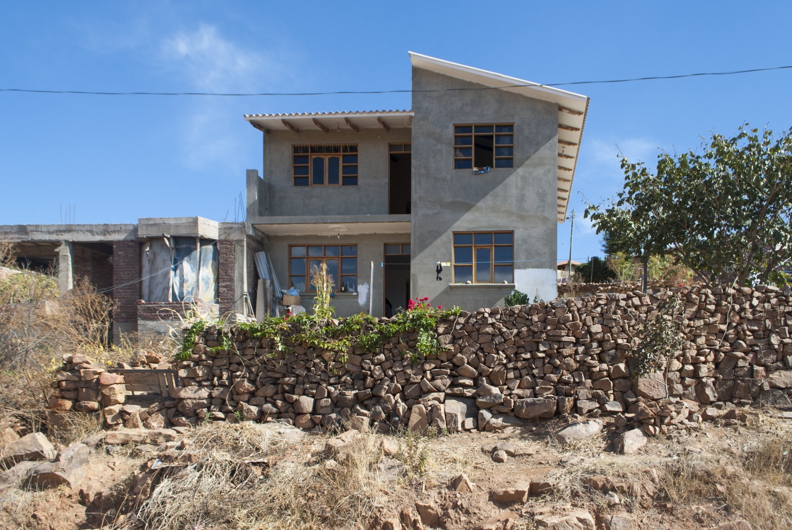 Photos -  Irene owns her home in Maria Auxiliadora, a community...