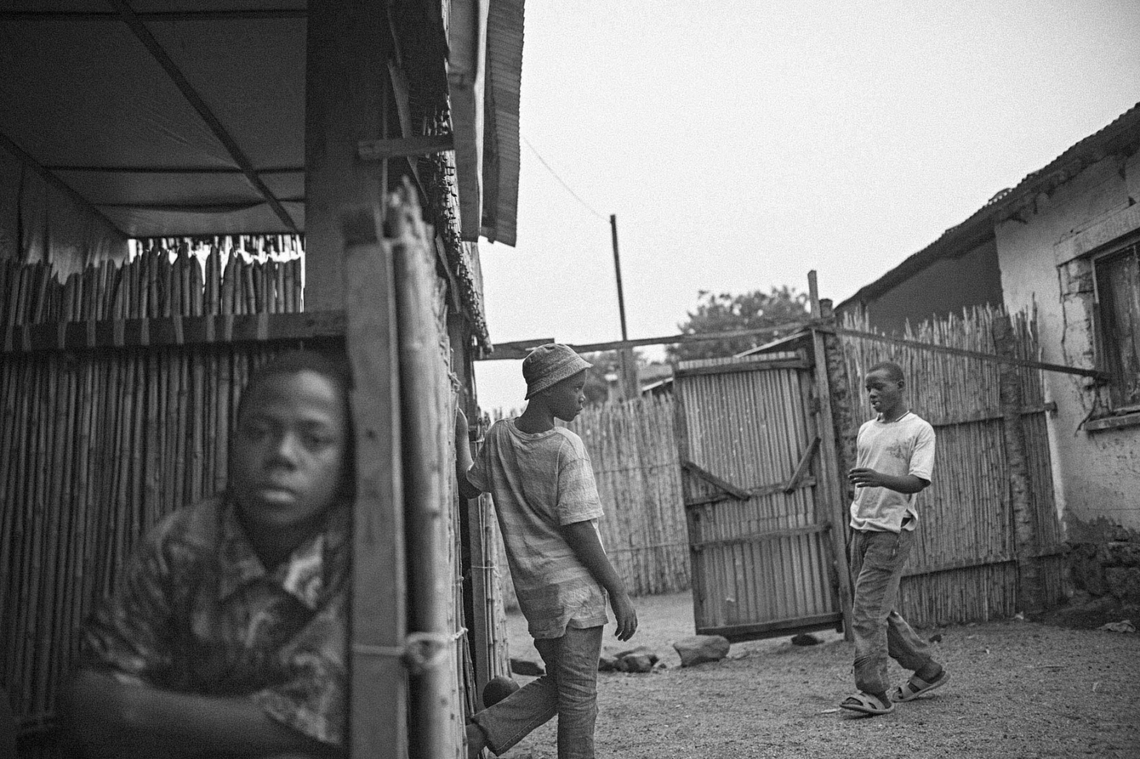 Former FDLR child soldier Samuel, 15, center, spends the afternoon at UPDECO's reintegration...