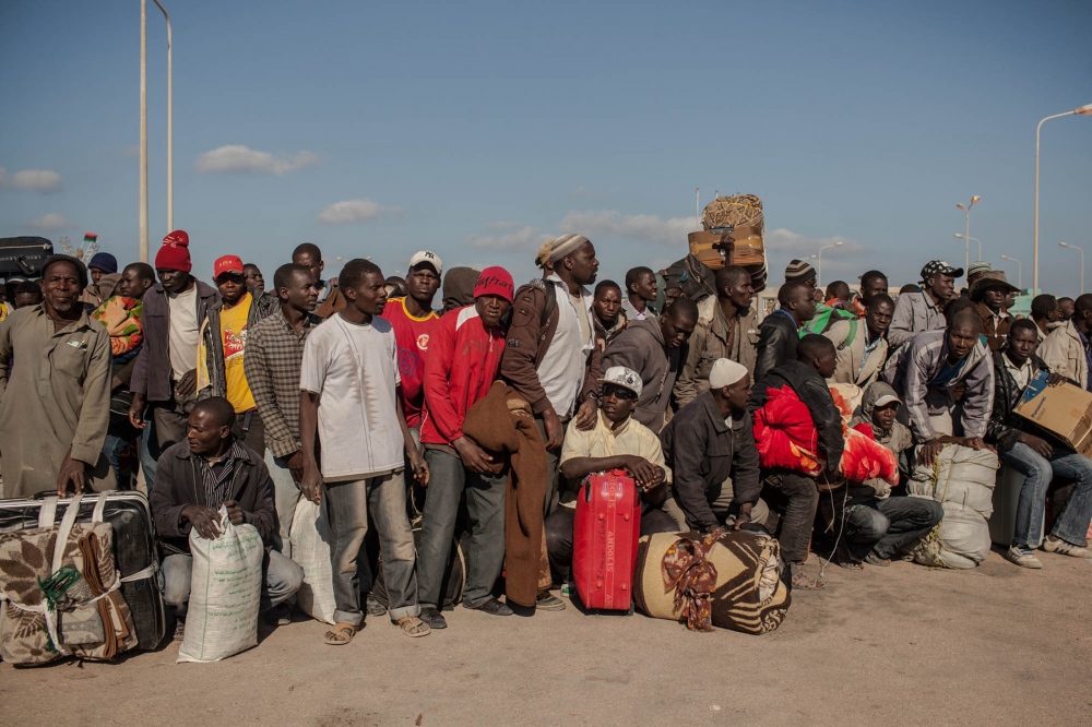 African migrant workers wait to...of Misurata on April 18, 2011. 