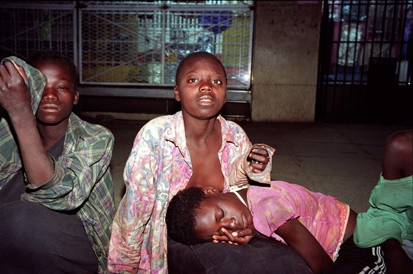 Street kids sniffing glue. They...incalculable.Kitwe, Zambia 8.03