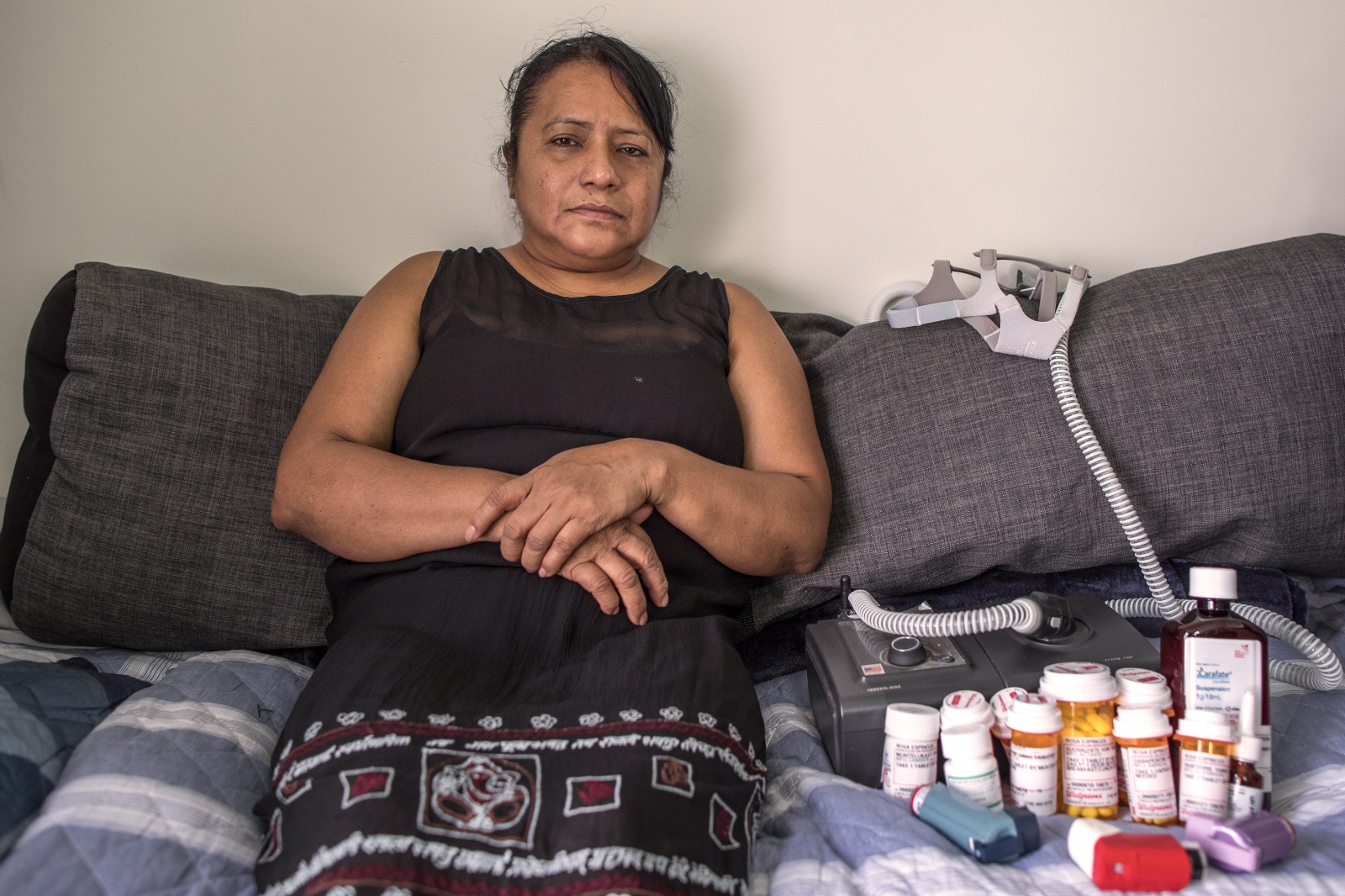  Rosa Espinosa, 53, Ecuadorean. She volunteered for four months at the World Trade Center and has cancer, asthma, sinusitis, reflux and urinary incontinence. &quot;I wish I could go to Ecuador and hug my children. It&#39;s not fair ... I never charged for the work.&quot; (All photos by Maite H. Mateo) 