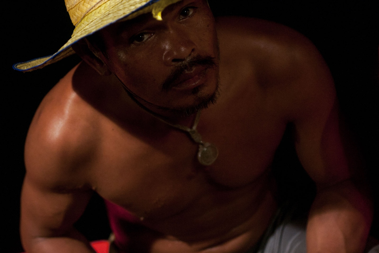 EMPTYING THE SEAS - The portrait of a Cambodian fisherman on a night trawler....
