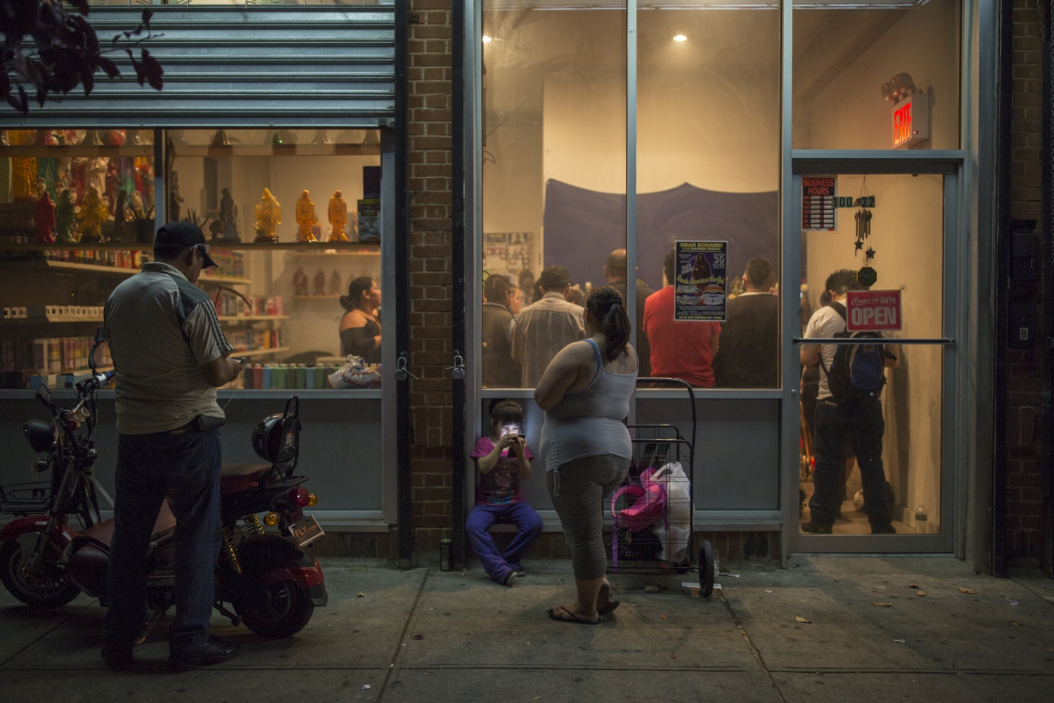 Santa Muerte devotees gather for a monthly rosary at the Botanica La Piadosa store in Queens, New...