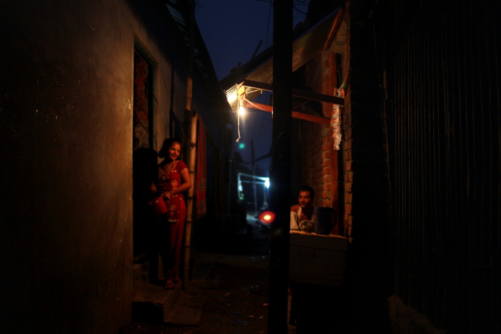A prostitute waiting for a cust...n the banks of the Padma River.