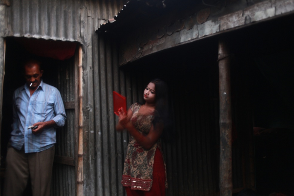Underage sex worker Sonia reapp...on the bank of the Padma river.