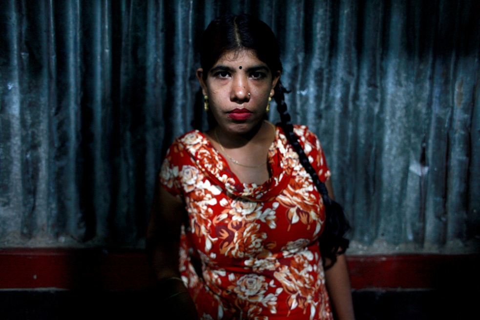 Portrait of an underage prostit...n the banks of the Padma River.