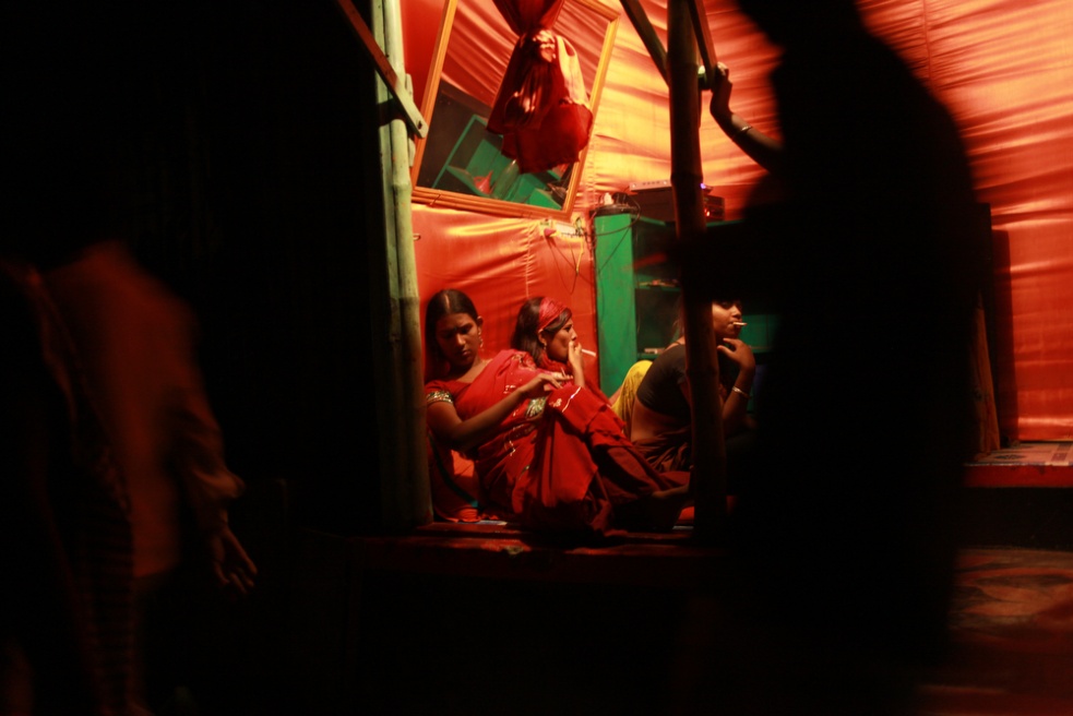 Sex workers wait in a corner sh...el is the largest in Bangladesh