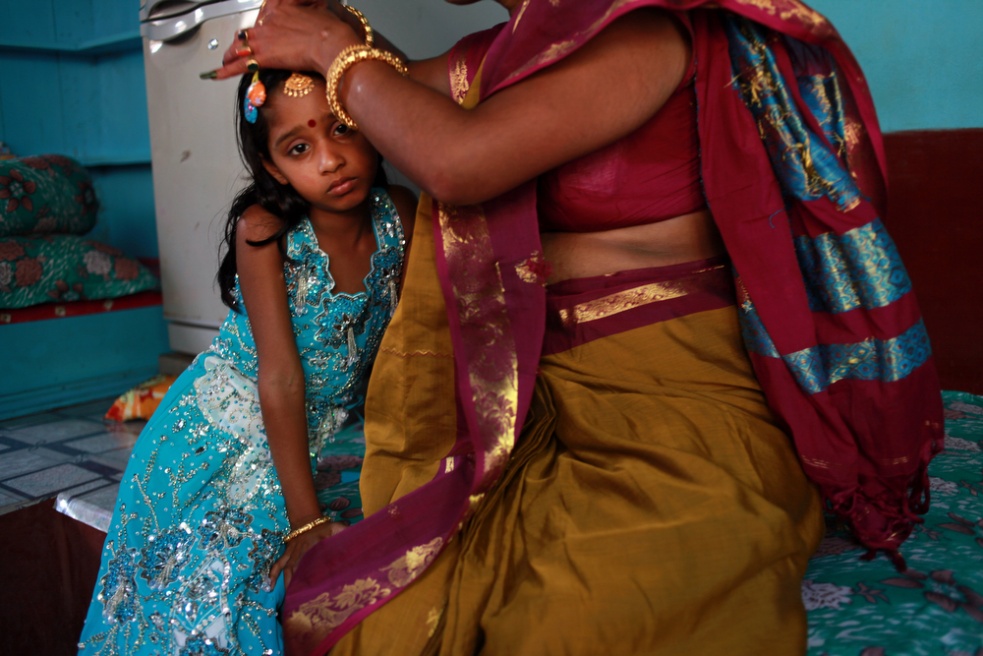The daughter of a prostitute ge...itution by the age of 12 or 13.