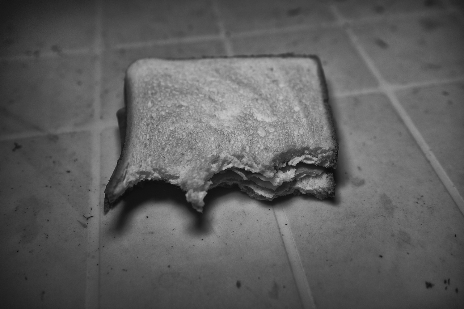Side effects -       A half-eaten sandwich on a dirty  table is Alfio's...