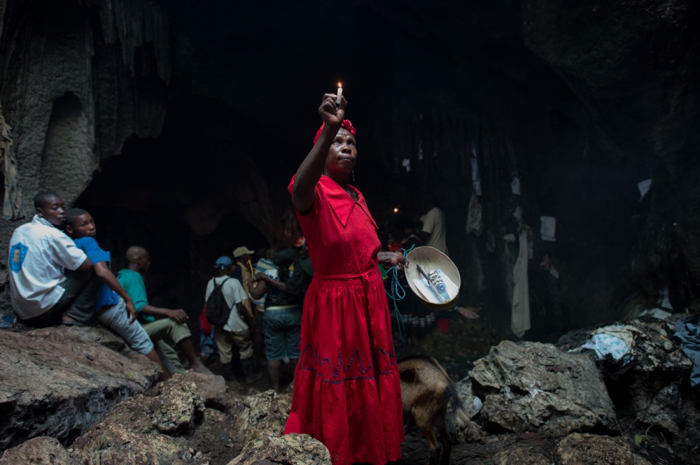 A Vodou priestess (Mambo) begin...si in a remote region of Haiti.