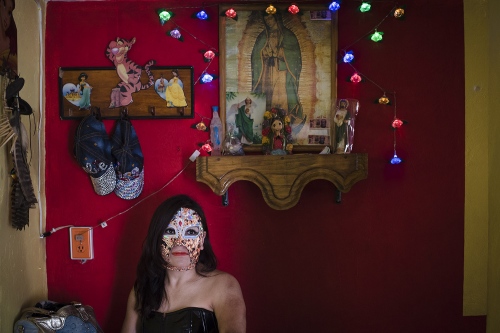 Image from LUCHADORAS - Xenia, this is her wrestler name, is posing in her house....
