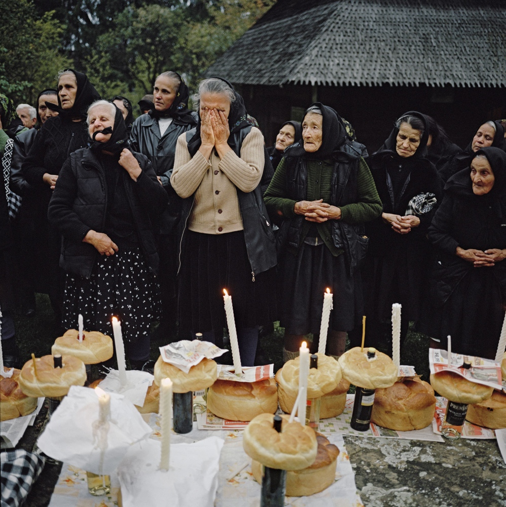 Transylvania: Built on Grass -  Day of the dead celebration in Budesti village. Bread...
