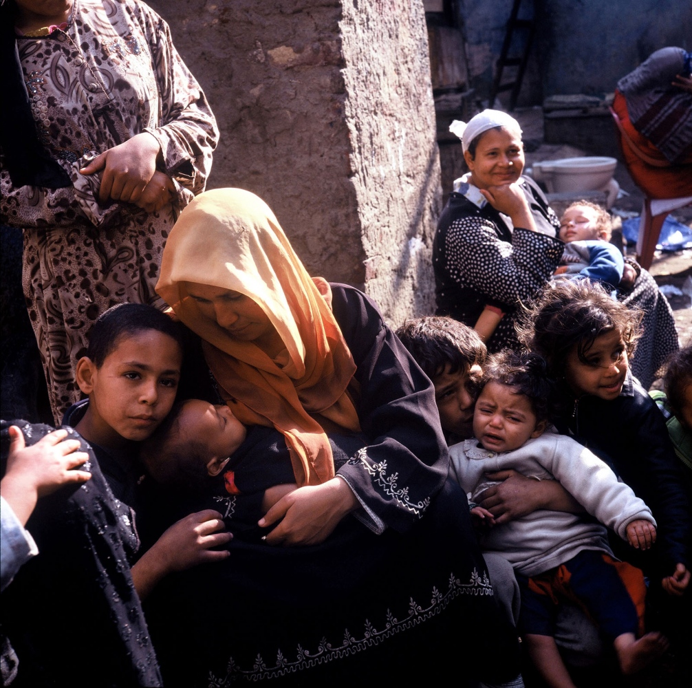 Cairo: Urban Decay -  Mother feeding her baby in Abu El Karn, an overpopulated...
