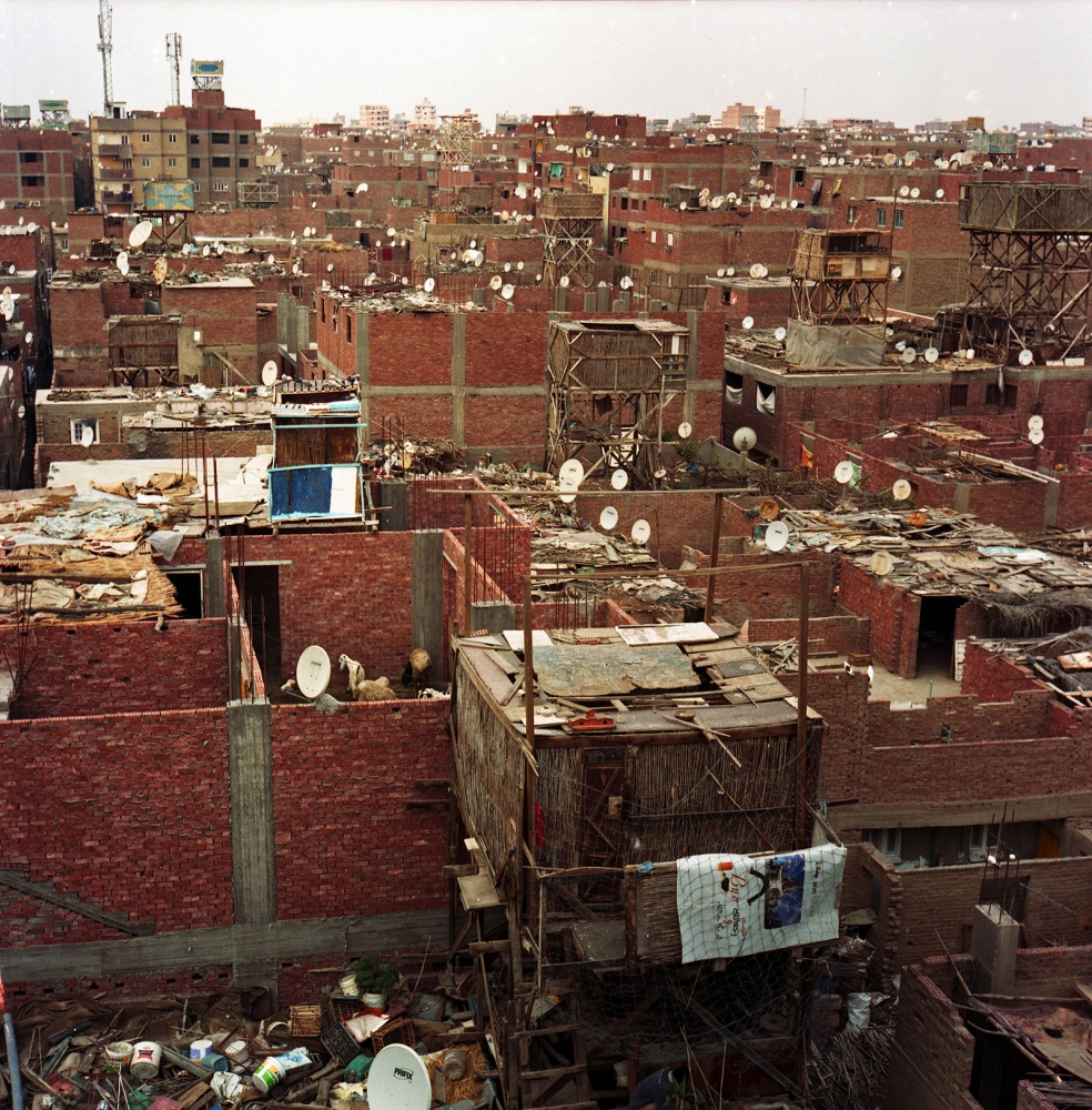Cairo: Urban Decay -  View over the informal settlements of red-brick...
