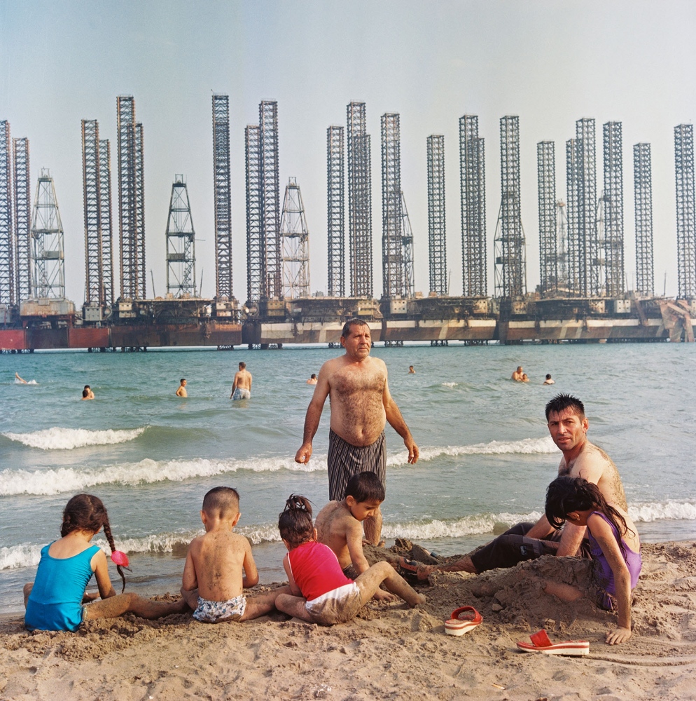 Caspian Mystique - A family enjoys downtime with idle Soviet oil rigs at...
