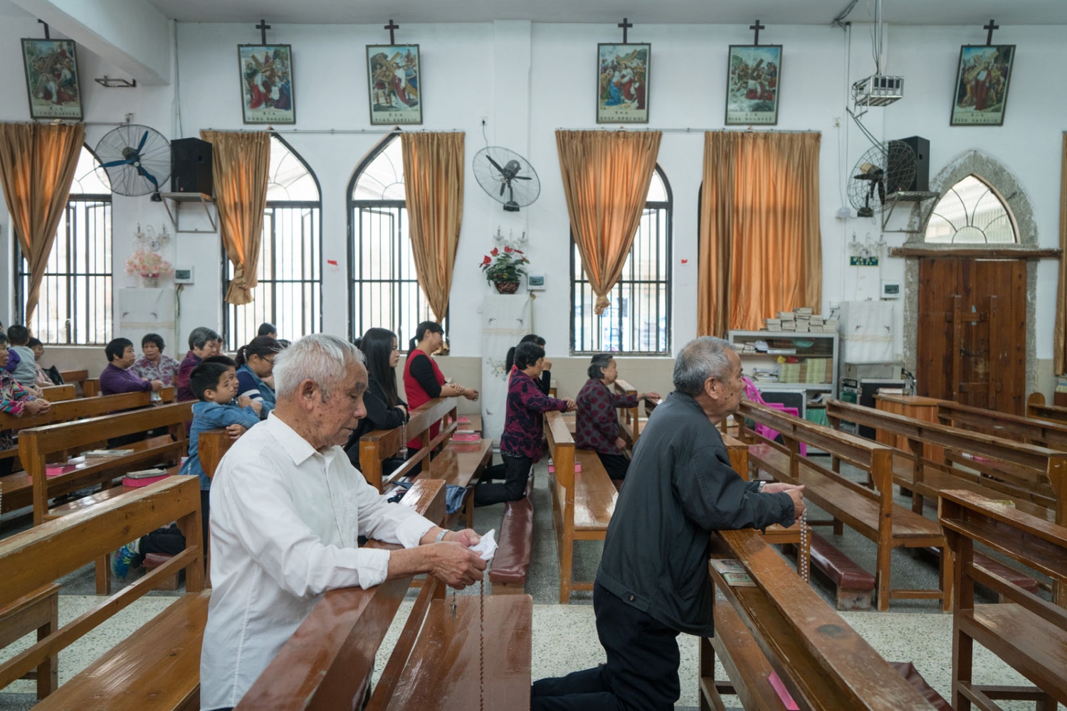 A Rural Chinese Catholic Village - Catholics from nearby villages pray and chant in Bobei...