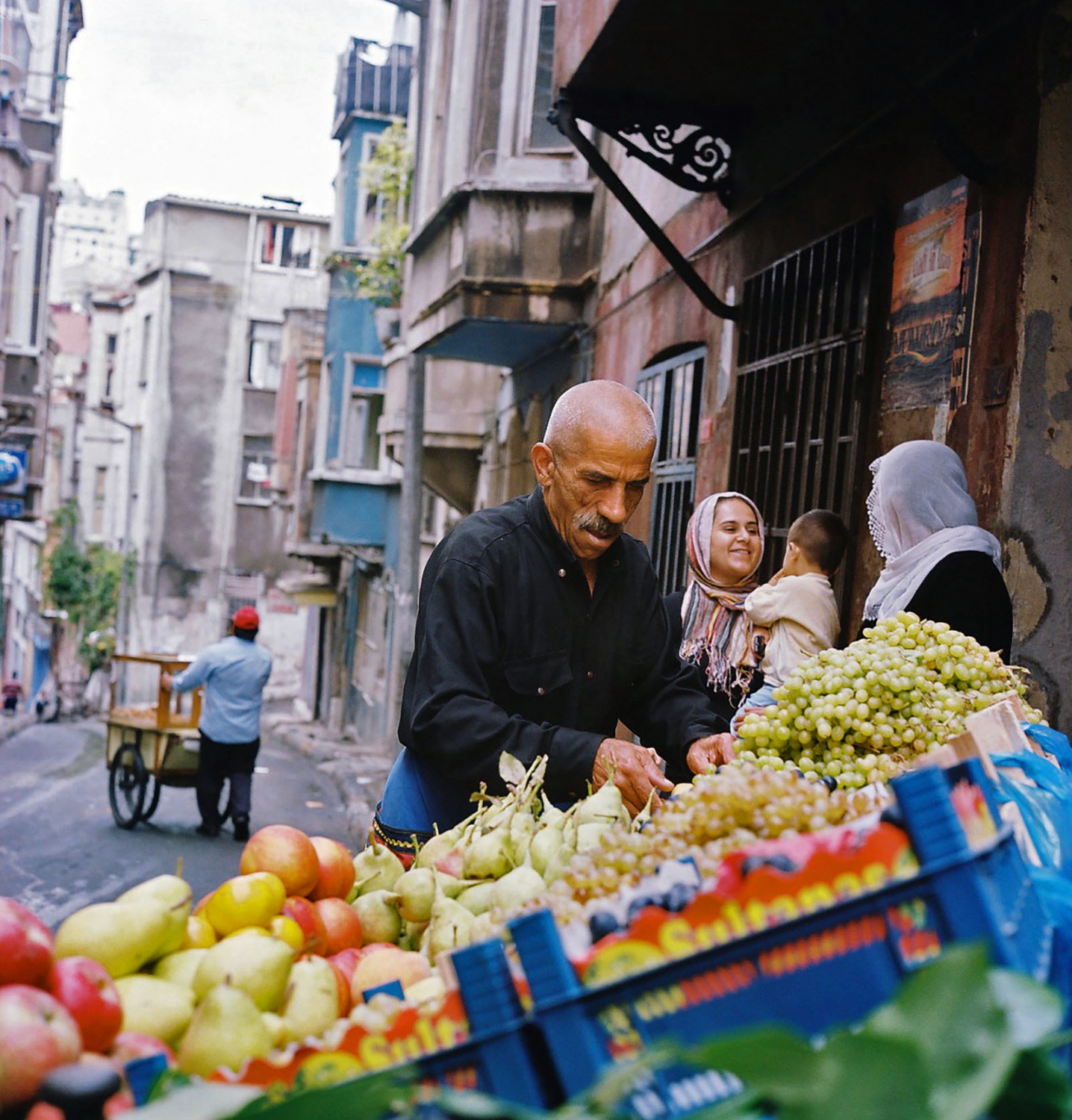 Fruit vendor in Tarlabasi. Istanbul, Turkey.Â September 2011 