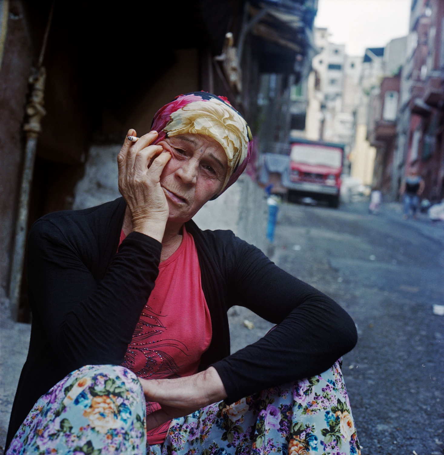 Last Dance of Tarlabasi - A Roma woman smoking on the street. Tarlabasi, Istanbul....
