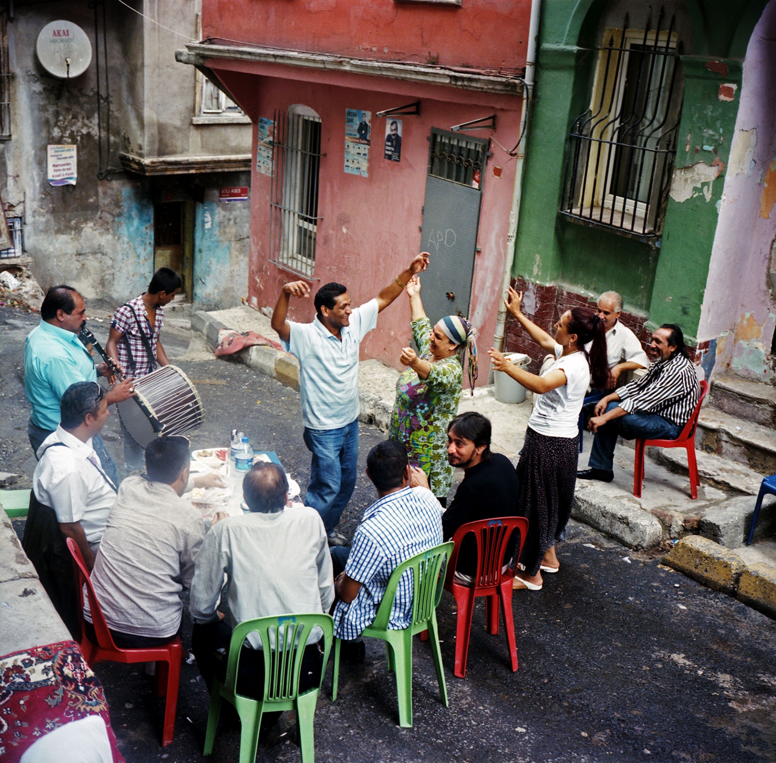 Last Dance of Tarlabasi - Roma family and community members dance on the street at...